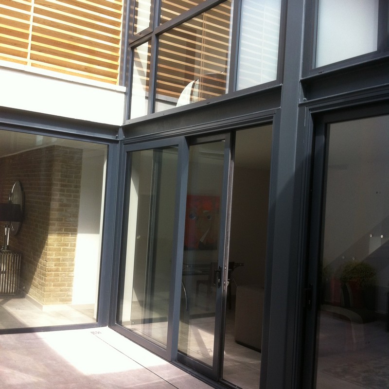 Anthracite aluminium sliding patio doors fitted in Bushey